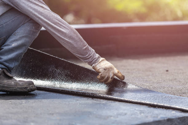 Professional Exterior Waterproofing technician working in Belding, MI